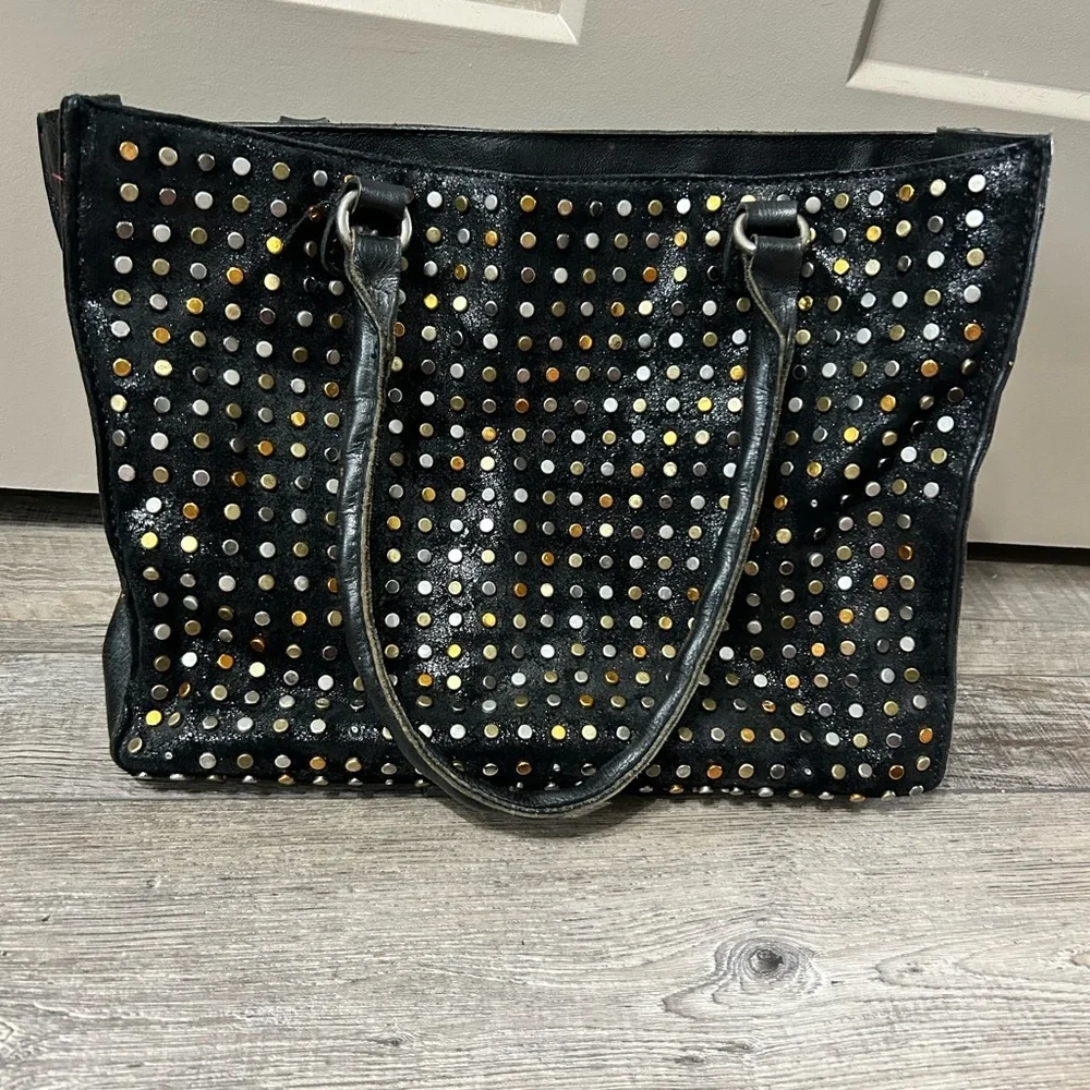 Patricia Nash Zancona Tote handbag featured with silver gold & bronze studs blk